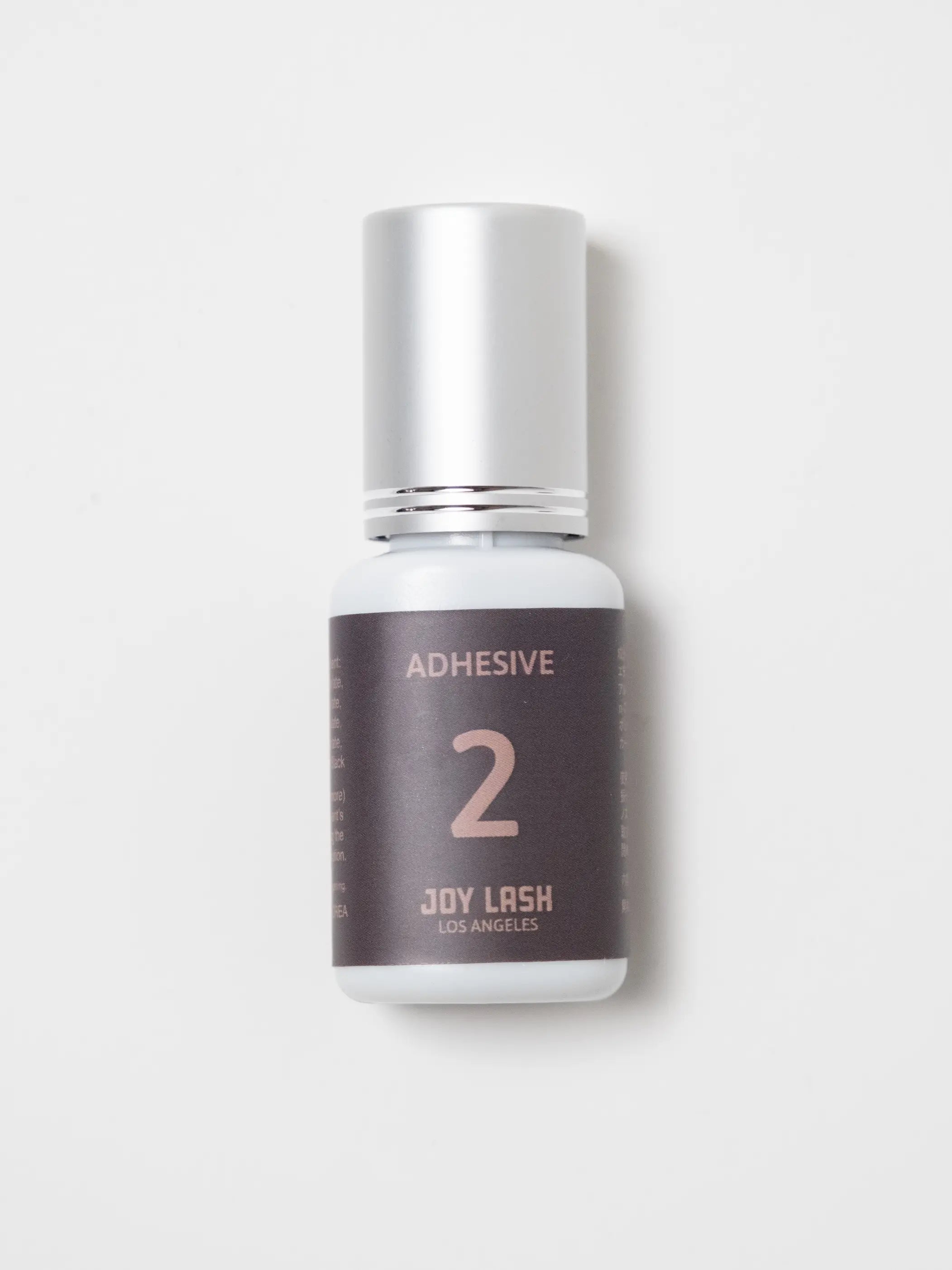 Adhesive Two 0.5 Second Professional Lash Adhesive Bottle, Quick-Dry Formula, Made in Japan.